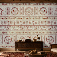 A traditional Indian living room titled “Warli Folk Tales – Vintage Red on White.” The focal wall is painted white and adorned with intricate earthy red Warli tribal art depicting village life, including dancing figures, farming scenes, huts, animals, and trees arranged in horizontal bands. Wooden furniture with ornate carvings, brass decorative items, and a patterned rug enhance the cultural richness, while soft lighting creates a warm and inviting atmosphere. The design blends indigenous artistry.