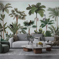 An architectural perspective of a contemporary living space featuring the Wild Wonderlands Mural in Porcelain Mint as a full-scale feature wall. The mural’s expansive botanical and wildlife vista pairs elegantly with light wood furniture and neutral textiles, creating a lively and cultured interior sanctuary.