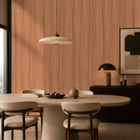 Wood Seamless Wallpaper - Cinnamon Peach showcased in a contemporary dining room featuring a warm almond beige wood-grain texture with a seamless vertical pattern. The wallpaper creates a sophisticated backdrop for neutral upholstered dining chairs, a round stone table, modern pendant lighting, and dark wood furniture, adding natural warmth, depth, and timeless elegance to the space.