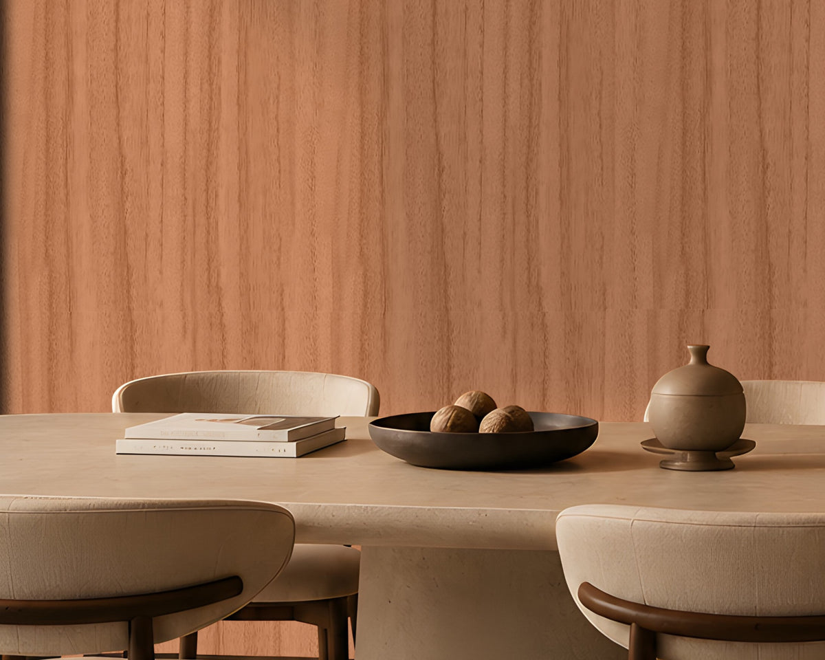 Wood Seamless Wallpaper - Cinnamon Peach showcased in a contemporary dining room featuring a warm almond beige wood-grain texture with a seamless vertical pattern. The wallpaper creates a sophisticated backdrop for neutral upholstered dining chairs, a round stone table, modern pendant lighting, and dark wood furniture, adding natural warmth, depth, and timeless elegance to the space.
