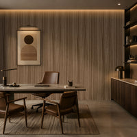Wood Seamless Wallpaper - Espresso Brown displayed in a contemporary home office featuring a warm almond-beige wood grain texture with seamless vertical patterns. The wallpaper creates a sophisticated backdrop for dark wood shelving, leather seating, modern artwork, and ambient lighting, adding natural warmth, depth, and elegance to the workspace.